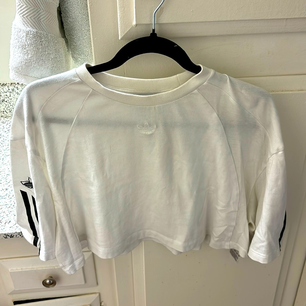 White Adidas Crop top. Size Medium. Some stripe detailing on sleeve